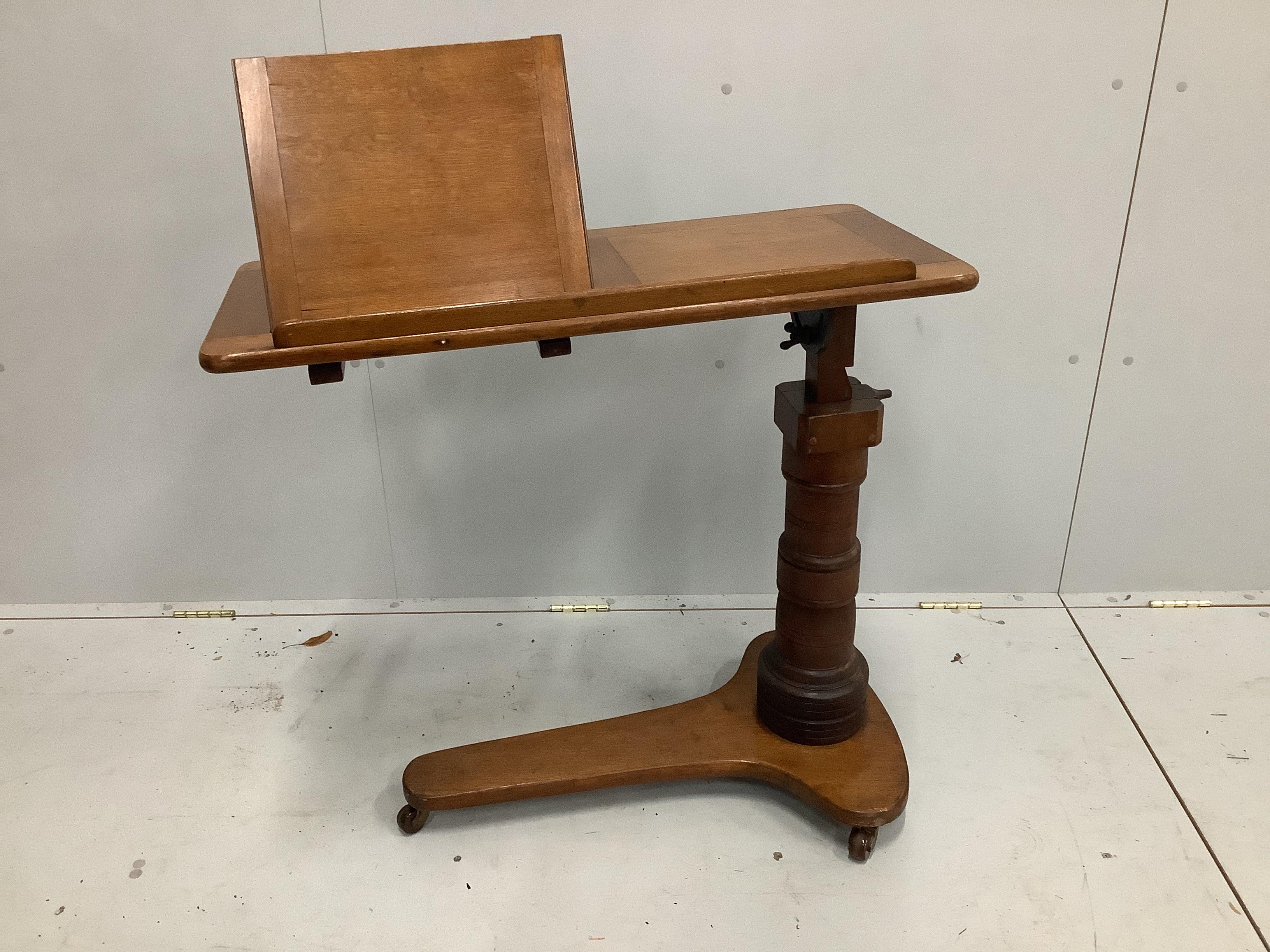 A Victorian mahogany adjustable reading table, width 81cm, depth 39cm